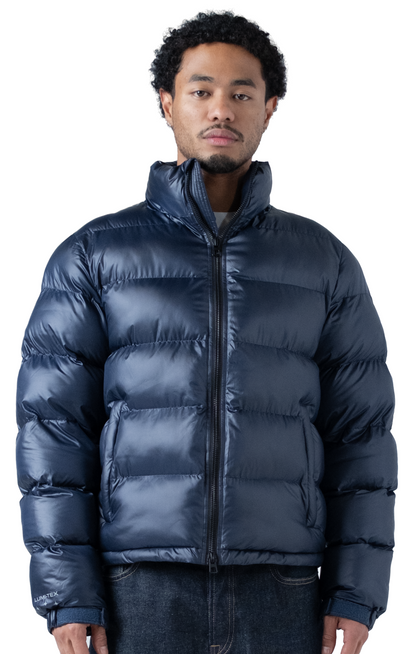 The Wave Hoodless Puffer Jacket Blue