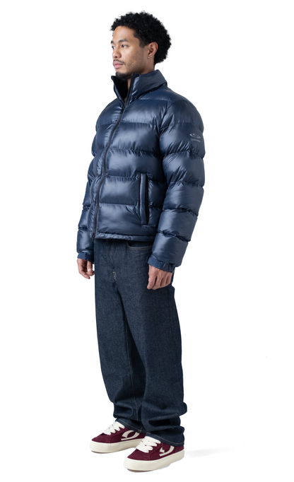 The Wave Hoodless Puffer Jacket Blue